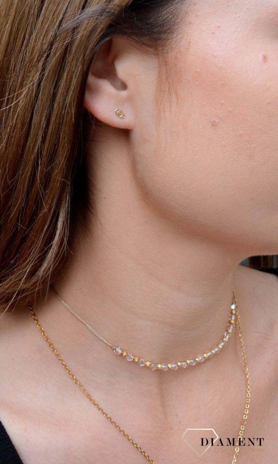 Złote kolczyki w kształcie serca łączone z nieskończonością KL 9928 333. Eleganckie kolczyki złote. Zdobione złote kolczyki. Kolczyki złote serca. Kolczyki w kolorze złotym. Kolczyki złote dla kobiet.jpg